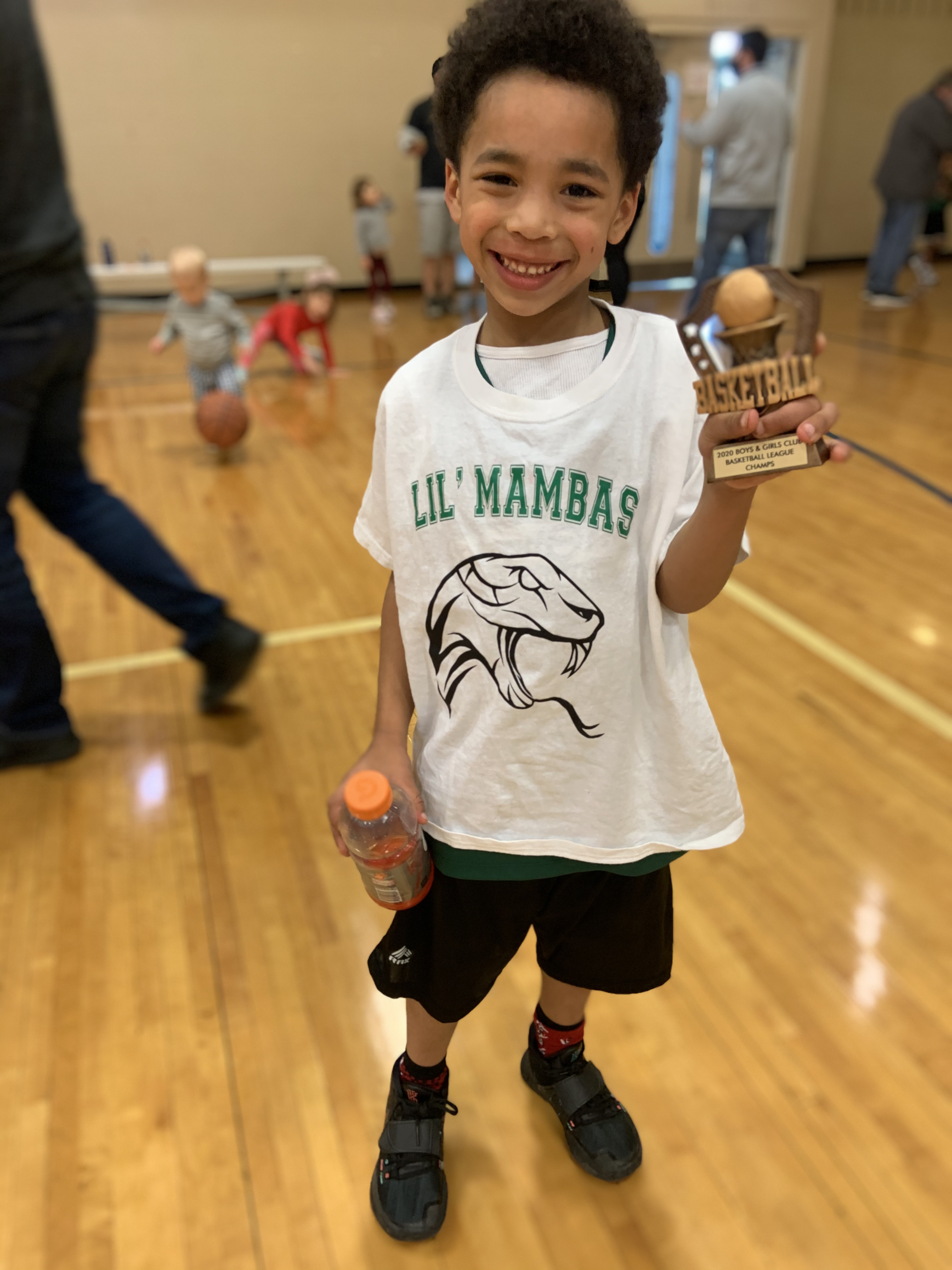 Darius playing basketball (First Trophy)